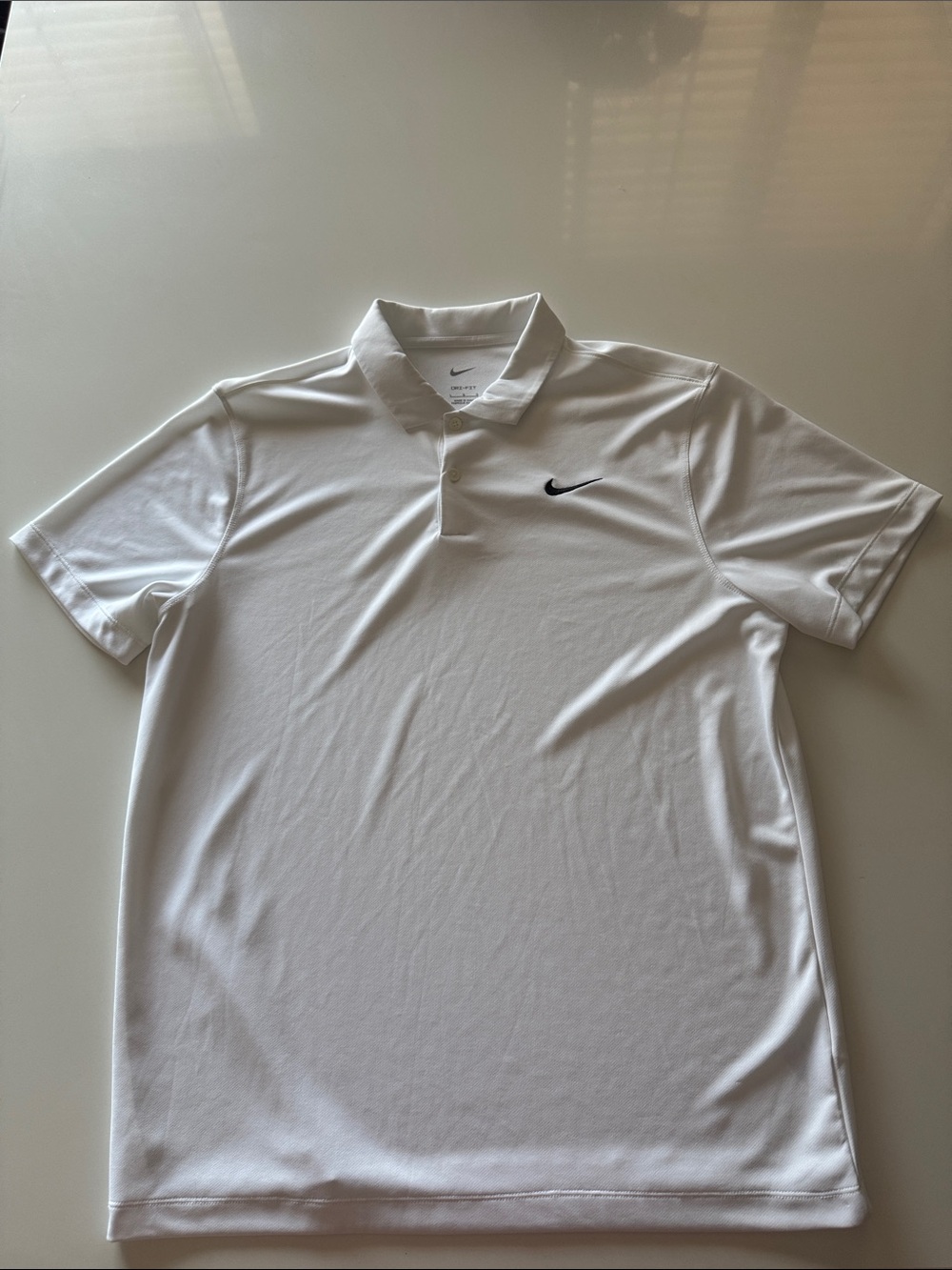 Nike DRI-FIT White Short-Sleeve
Henley Polo